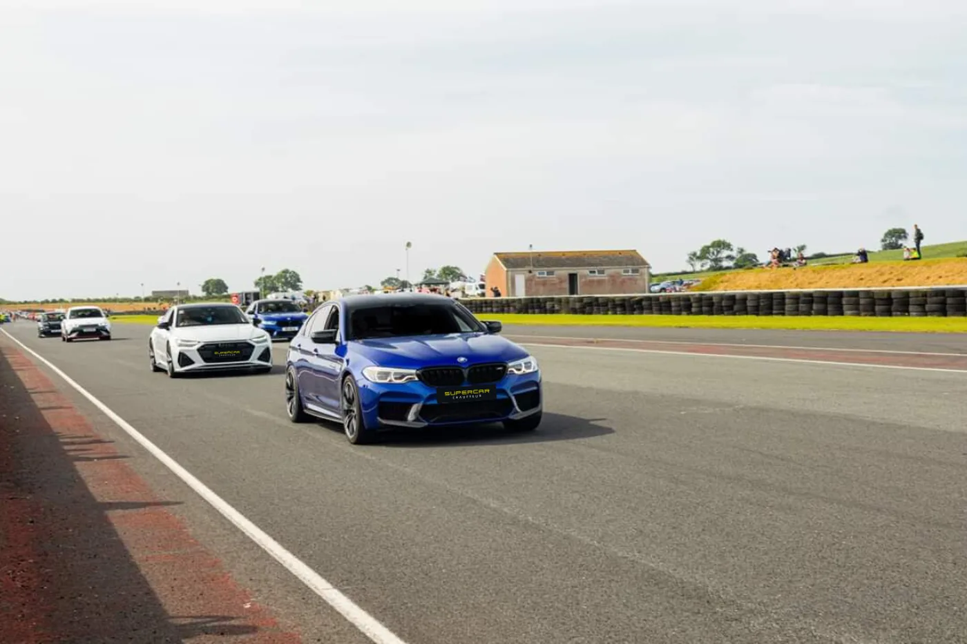 Blue BMW M5 F90 on a day out